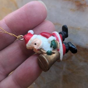 Tiny Santa Saxophone ornament
